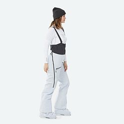 WEDZE Dámske lyžiarske náprsenkové nohavice FR900 svetlomodré šedá M